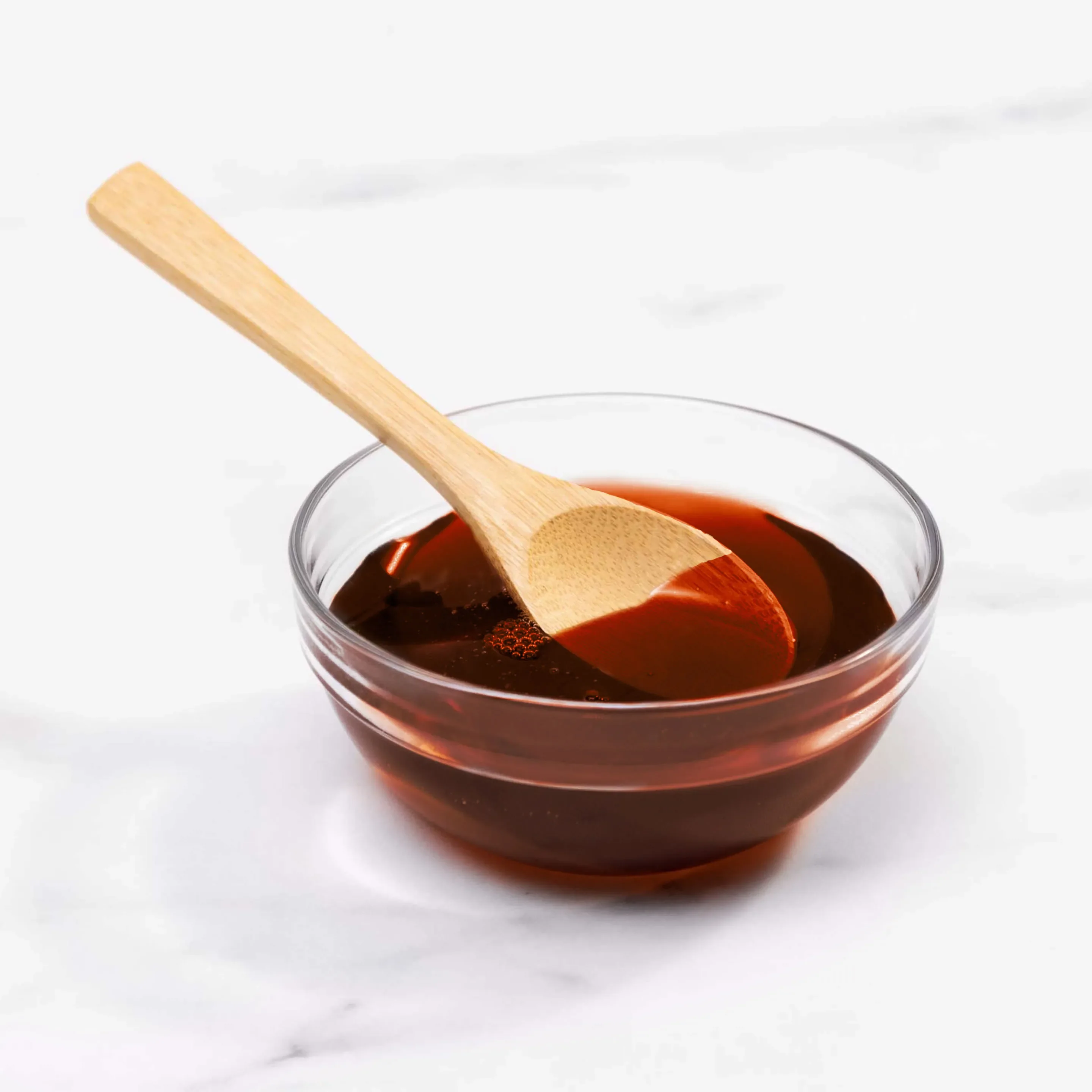 Hazelnut syrup in clear bowl