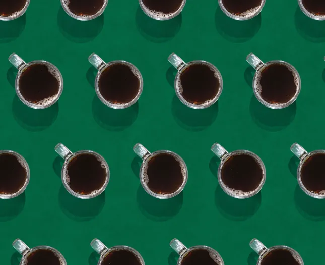 Coffee Mugs on Green Background